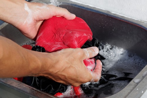 Use less detergent and cool water if you decide to hand wash your cycling shorts.