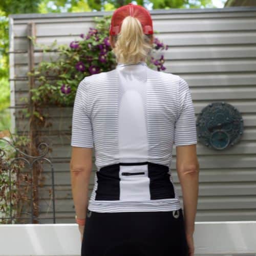 Jennifer wearing Cafe Du Cycliste Francine jersey - back view
