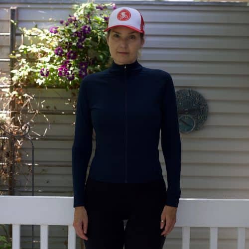 Jennifer wearing Isadore Winter Long Sleeve Jersey in color Midnight Navy- Front View